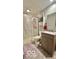 Bathroom featuring shower, toilet, vanity, mirror and storage at 865 Countryside Ln, Columbus, IN 47201