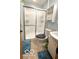 Bathroom with a shower, toilet, sink, and cabinet at 865 Countryside Ln, Columbus, IN 47201