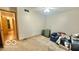 Neutral bedroom needing some TLC, featuring carpeted floors at 865 Countryside Ln, Columbus, IN 47201