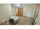 Bedroom needing TLC featuring a ceiling fan and window at 865 Countryside Ln, Columbus, IN 47201