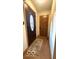 Inviting entryway with decorative front door and a wood floor that welcomes you inside at 865 Countryside Ln, Columbus, IN 47201