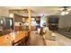 Open-concept layout seamlessly connects the kitchen, dining, and living areas with a fireplace at 865 Countryside Ln, Columbus, IN 47201