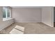 Bright bedroom with large windows letting in lots of natural light with neutral carpeting at 8908 Sunningdale Blvd, Indianapolis, IN 46234