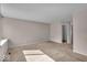 Spacious bedroom featuring neutral carpeting, lots of natural light, and ample closet space at 8908 Sunningdale Blvd, Indianapolis, IN 46234