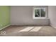 Bedroom featuring carpet, neutral paint and a large window at 8908 Sunningdale Blvd, Indianapolis, IN 46234