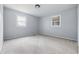 Bedroom showcasing neutral carpet and two windows providing ample natural light at 903 Sunset Dr, Lebanon, IN 46052