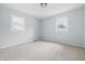 Bedroom with neutral carpet and two windows providing ample natural light at 903 Sunset Dr, Lebanon, IN 46052