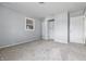 Bedroom showcasing neutral carpet, a closet and a window bringing in natural light at 903 Sunset Dr, Lebanon, IN 46052