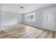 Bright living room with new floors, bay window, and fresh paint provides an inviting space at 903 Sunset Dr, Lebanon, IN 46052