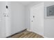 Utility room showing washer hookups, a door, and light gray walls at 903 Sunset Dr, Lebanon, IN 46052