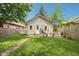 Backyard featuring a deck with lounge set and egg chair at 923 42Nd St, Indianapolis, IN 46205