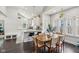 Bright, open kitchen featuring a breakfast bar, and adjacent dining area with hardwood floors at 923 42Nd St, Indianapolis, IN 46205