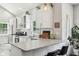 Bright, modern kitchen with white cabinetry, quartz countertops, and stainless steel appliances at 923 42Nd St, Indianapolis, IN 46205