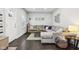 Cozy living room with dark wood floors and a large sectional sofa at 923 42Nd St, Indianapolis, IN 46205