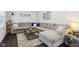 Bright living room showcases comfortable sectional sofa and dark wood floors at 923 42Nd St, Indianapolis, IN 46205