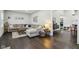 Spacious living room offers dark wood floors and a comfortable sectional sofa at 923 42Nd St, Indianapolis, IN 46205