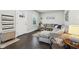 Inviting living room with dark wood floors and a comfortable gray sectional at 923 42Nd St, Indianapolis, IN 46205