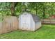 Backyard with shed and wood fence at 923 42Nd St, Indianapolis, IN 46205