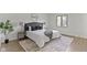 Spacious bedroom with modern decor and wood-look flooring at 10502 E Lakeshore Dr, Carmel, IN 46033