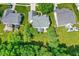 Aerial view of home showcasing the backyard and mature trees at 10965 Fairway Ridge Ln, Fishers, IN 46037