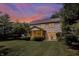 Backyard and patio area featuring a screened porch at 10965 Fairway Ridge Ln, Fishers, IN 46037