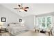 Bedroom with ceiling fan, natural light, and neutral carpet at 10965 Fairway Ridge Ln, Fishers, IN 46037