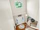 Bright foyer with chandelier, wood floors and stairway at 10965 Fairway Ridge Ln, Fishers, IN 46037