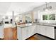 Open concept kitchen features granite countertops and stainless steel appliances with an eat-in area at 10965 Fairway Ridge Ln, Fishers, IN 46037