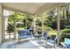 Relaxing screened porch with cozy seating, a ceiling fan, and access to the backyard at 10965 Fairway Ridge Ln, Fishers, IN 46037