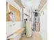 Well-organized basement with shelving, workbench, and utility systems at 1108 Northfield Ln, Anderson, IN 46011