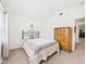 Bedroom featuring vaulted ceilings, a closet, a plush bed, and a dresser at 1108 Northfield Ln, Anderson, IN 46011