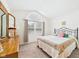 Cozy bedroom with a vaulted ceiling, large window, and comfortable furnishings at 1108 Northfield Ln, Anderson, IN 46011