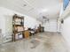 View of garage interior with storage at 1108 Northfield Ln, Anderson, IN 46011