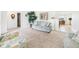 Comfortable living room with stylish furnishings, a large window, and doorway to dining area at 1108 Northfield Ln, Anderson, IN 46011