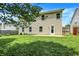 Expansive backyard featuring a lush lawn and concrete patio, perfect for outdoor entertaining or relaxation at 11437 High Grass Dr, Indianapolis, IN 46235