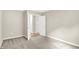 Neutral bedroom with carpeted floors and open doorway, offering a serene space at 11437 High Grass Dr, Indianapolis, IN 46235