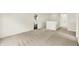 Upstairs bonus room featuring neutral walls, carpeted floors and natural light at 11437 High Grass Dr, Indianapolis, IN 46235
