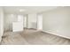 Spacious upstairs bonus room featuring neutral walls, carpeted floors and natural light at 11437 High Grass Dr, Indianapolis, IN 46235