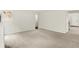 Spacious living room with neutral walls, carpet, and an open doorway at 11437 High Grass Dr, Indianapolis, IN 46235