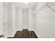 Walk-in closet featuring wood floor and white wire shelving at 11437 High Grass Dr, Indianapolis, IN 46235
