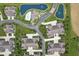 Birds-eye view of residences with landscaping, pond feature, and community pool showcasing the neighborhood at 1146 Distinctive Way, Greenfield, IN 46140