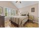 Cozy bedroom showcasing a large window, providing ample natural light at 1146 Distinctive Way, Greenfield, IN 46140