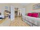 Cozy bedroom with daybed, desk, and french doors showcasing an inviting, light-filled space at 1146 Distinctive Way, Greenfield, IN 46140