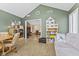 Open-concept living room with view into kitchen, ample space for furniture, and stylish decor at 1146 Distinctive Way, Greenfield, IN 46140