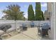 Cozy patio with outdoor seating, grill, and privacy fence, perfect for relaxing and entertaining at 1146 Distinctive Way, Greenfield, IN 46140