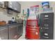 Well organized storage room with cabinets, counter space, and tool storage at 1146 Distinctive Way, Greenfield, IN 46140