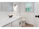 Modern bathroom featuring a new vanity and black fixtures at 12112 Roxbury Pl, Carmel, IN 46033
