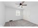 Bedroom featuring neutral carpet, a ceiling fan, and a closet with sliding doors at 12112 Roxbury Pl, Carmel, IN 46033