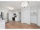 Kitchen with modern stainless-steel appliances, white cabinets and granite countertops at 12112 Roxbury Pl, Carmel, IN 46033
