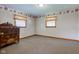 Comfortable bedroom with carpet, natural light, and a traditional-style dresser at 132 S First St, Jamestown, IN 46147